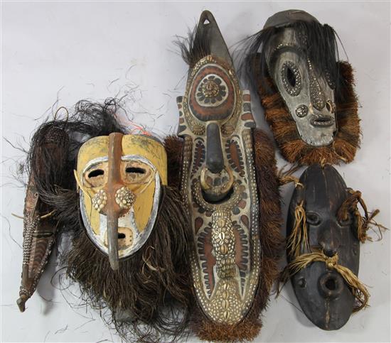 Five Sepik River wooden tribal masks, various